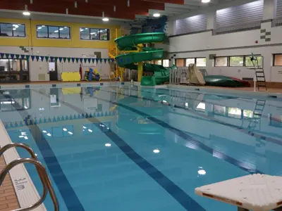 The pool with calm reflective water.